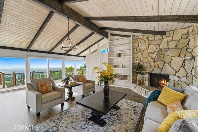 Living room with a wall of windows to the world.