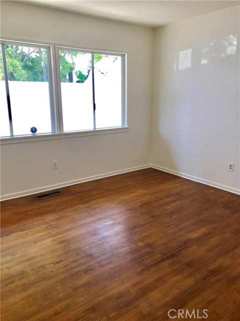 bedroom -hardwood flooring