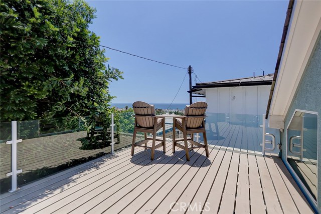 top level patio perfect for enjoying ocean views and entertaining with family/friends