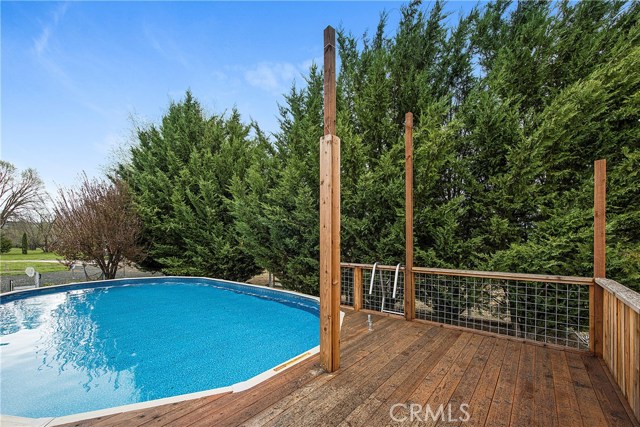 Custom built lounging deck off pool.