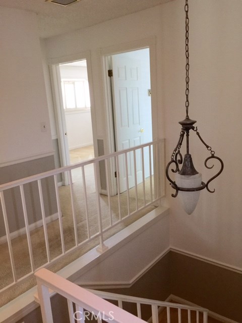 Front house stairway, chandelier, custom paint