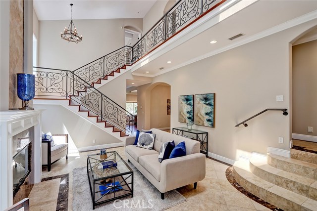 Truly a custom built home with visually striking 2 story entry and living room.