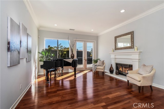 Formal Living Room with Fireplace and French Doors to the Back Yard!