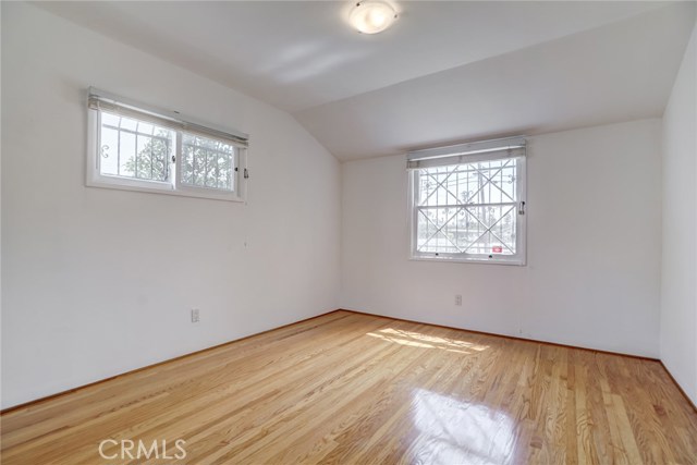 Beroom #3 - Front Bedroom: Hardwood floors and plenty of natural light from the windows.