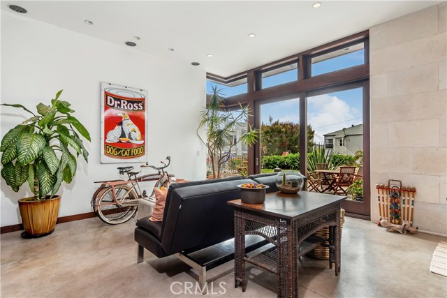 Front entry leads out to patio on the walk street