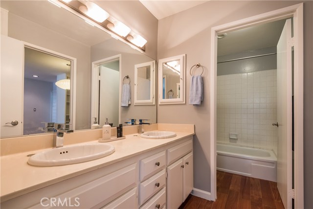 Dual vanity sinks, new faucets & Toto toilet.