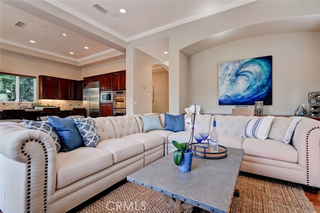 Oversized family room overlooks private rear yard and entertaining area.