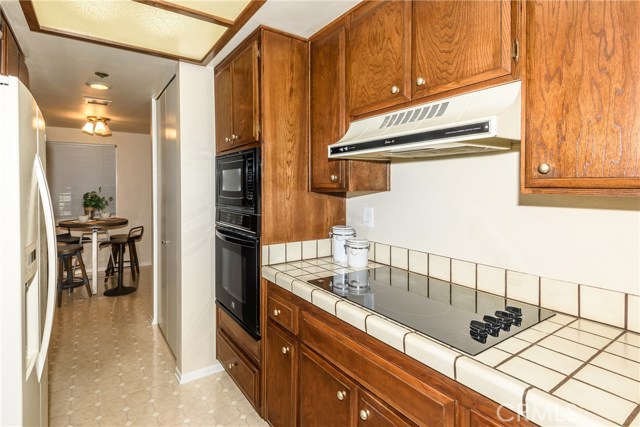 Kitchen and Breakfast Nook with Laundry Area