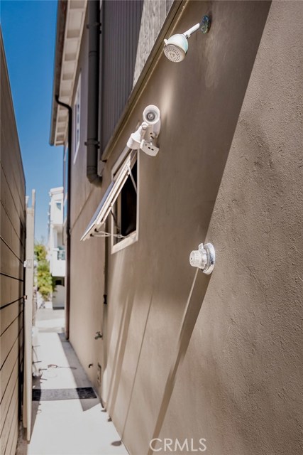 Yup, it's a beach shower on the rear west side. That's convenient!