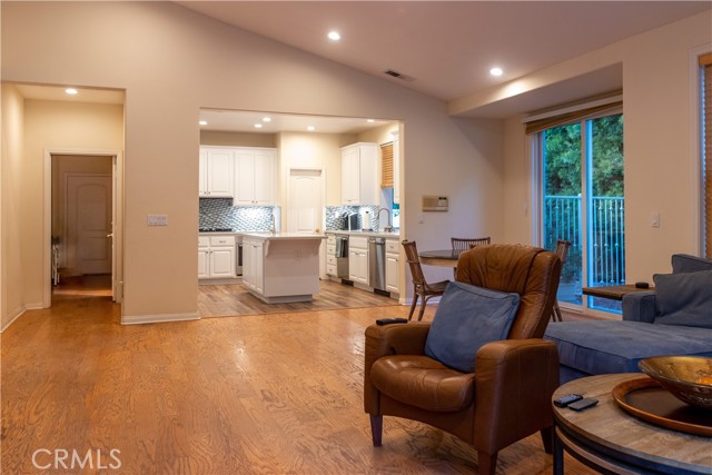 Family room area that opens to the kitchen and patio/ bar be que area
