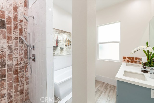 Stylish architectural features distinguish the master bath