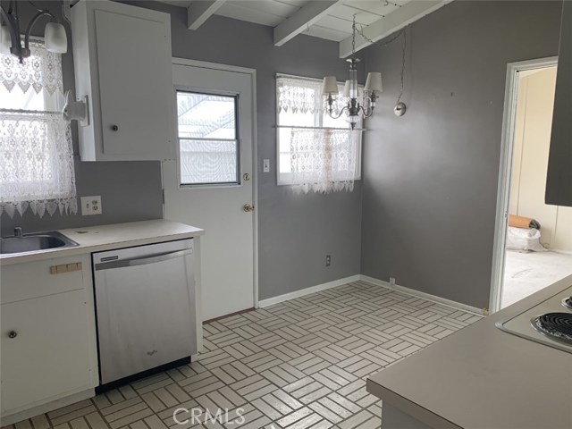 kitchen to dining & side door to patio & backyard