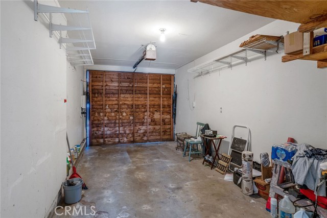 BACK HOUSE: ATTACHED AND PRIVATE 1 CAR GARAGE.