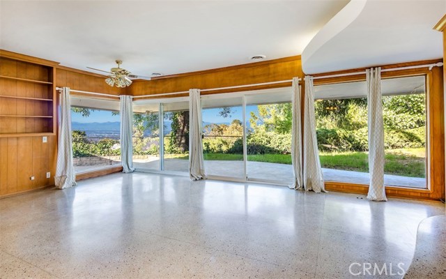 Family Room with Grassy Backyard and City Views