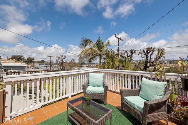 Enjoy the neighborhood views from this front deck