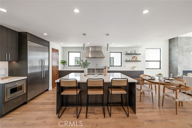 Stunning dream kitchen with immpeccable craftsmanship and decadent finishing touches (shown here using reverse of 961 Unit A staging)