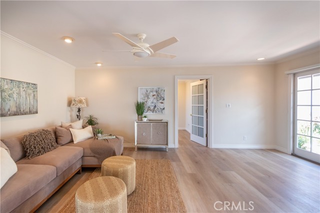 Family room located next to the kitchen with sliding doors to the patio