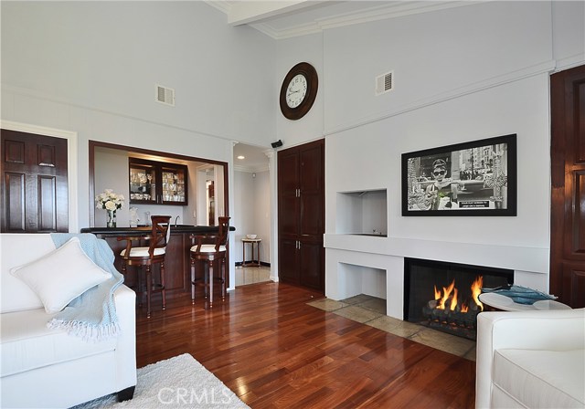 Family room features gas/wood burning fireplace and wet bar - great place to relax or entertain.