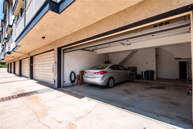 Over sized garage with  direct interior access and 275 square feet of additional enclosed storage