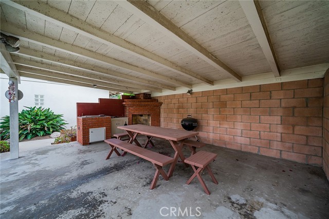 Backyard with Outdoor Fireplace and Bbq area