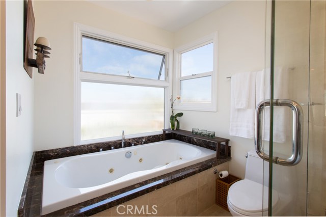 Jet Tub Surrounded By Windows.