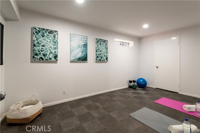 Lower level bonus room makes the perfect gym or play room.