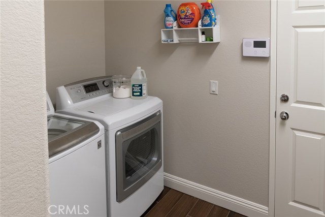 Laundry room with door to garage