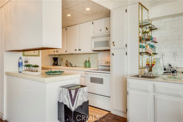 Bright Galley Kitchen and Wetbar