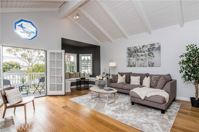 High vaulted ceilings and engineered french oak hardwood floors throughout