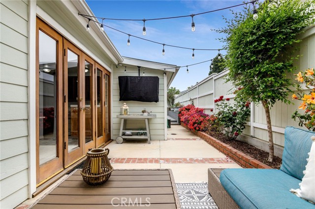 French doors on two sides bring light and warmth to the home