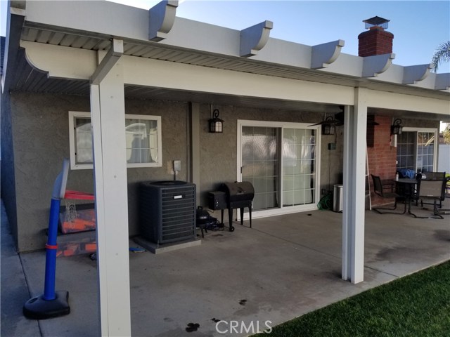 Master bedroom doors open to backyard