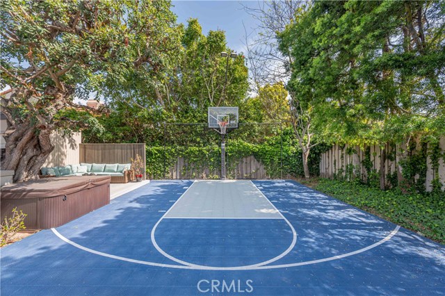 Commercially installed sport court with lighted backboard