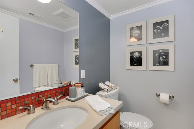 Remodeled and large 1/2 bathroom right off living space downstairs Remodeled and large 1/2 bathroom right off living space downstairs