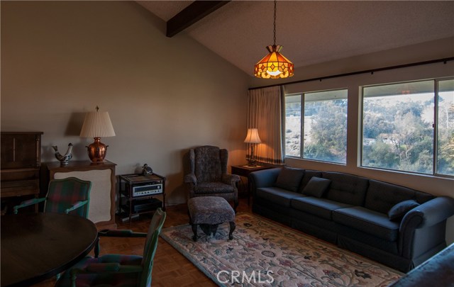 Other side of the Family Room offers gorgeous views of the canyon, natural light and brings the outdoors together with the indoors.