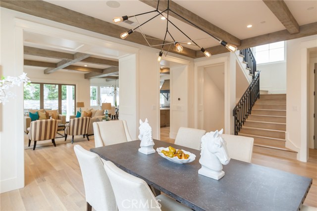 Dining area, staircase leading to 5 bedrooms and laundry