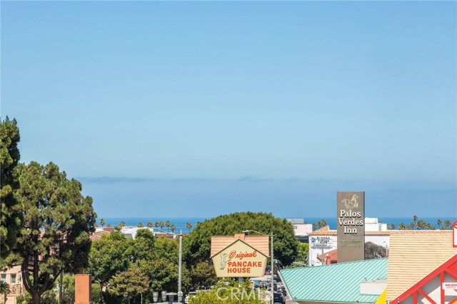 Ocean view (with a bonus view of the marine layer on photography day!) from the primary bedroom. [upstairs]