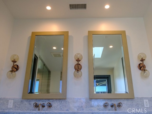 Master Bath Custom Double Sink with Granite Counter Tops and Custom Cabinets- Note the built in Outlets in the Medicine Cabinets and Drawers when you visit.