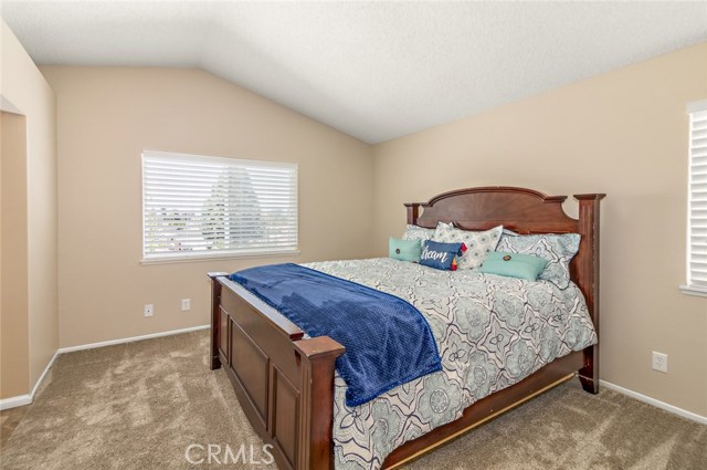 Master bedroom is spacious and has large windows