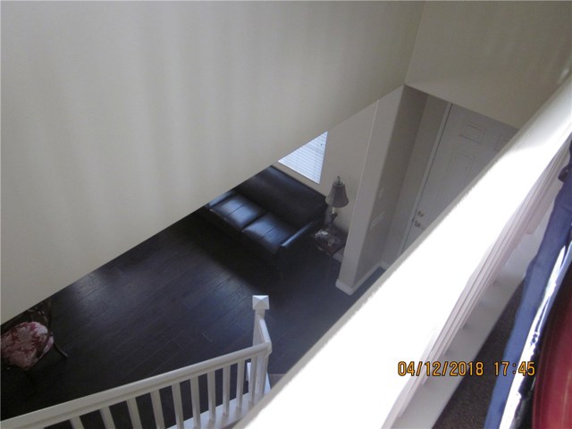 View to entry and living room from loft.