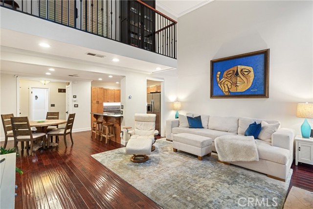 The soaring ceilings and open floorplan makes for an inviting and impressive setting.