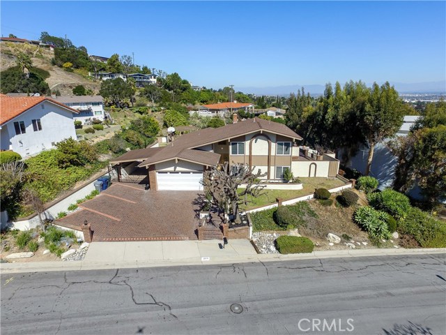 Notice the large driveway.  Room for three cars plus room for two more cars to get in and out of garage.