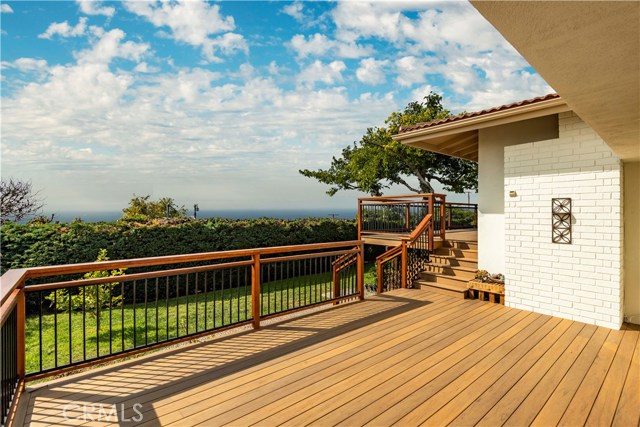 Lower level deck and flat backyard