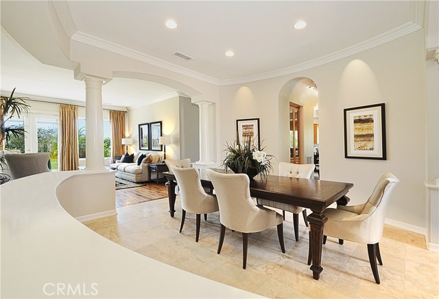 Formal Dining Room Opening to Living Room