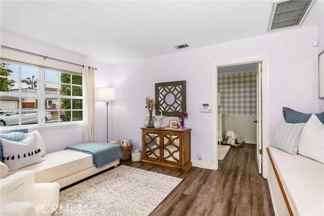 Spacious den is perfect playroom or guest room