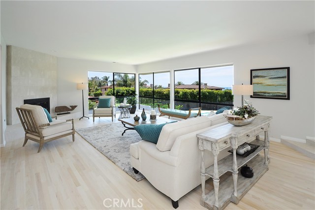 Living room with lots of windows to enjoy the view!