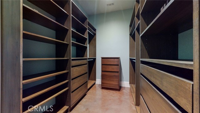 Main Floor Master Bedroom Walk In Closet, plenty of storage!