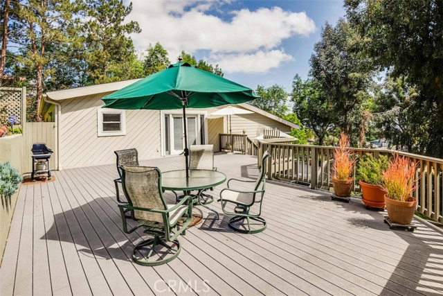 large upper deck surrounded by nature