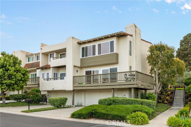 Direct-access 2-car garage and wrap-around balcony are just two of this home's appealing features.