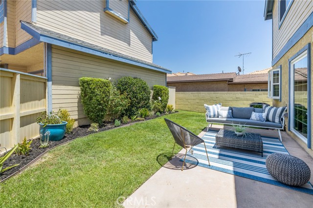 Catch some sun in the private and newly landscaped backyard.