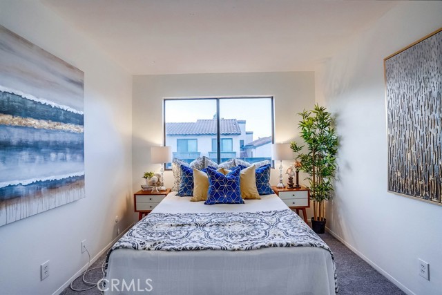 one of the 2 second floor bedrooms